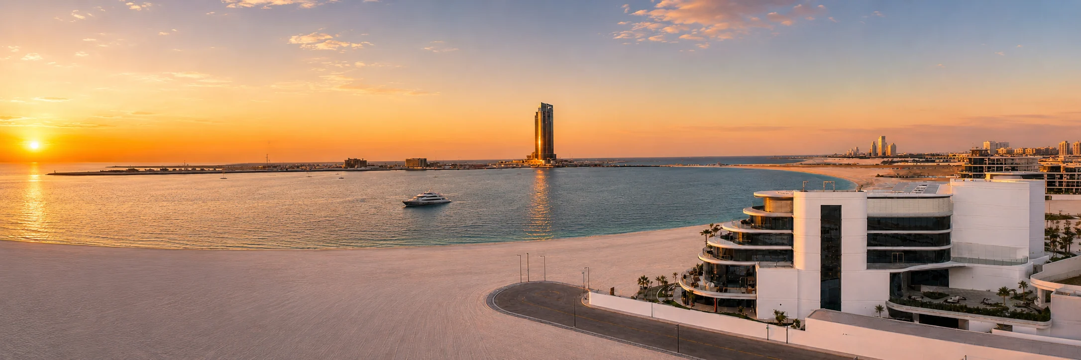 Al Marjan Island at sunset with the Wynn tower